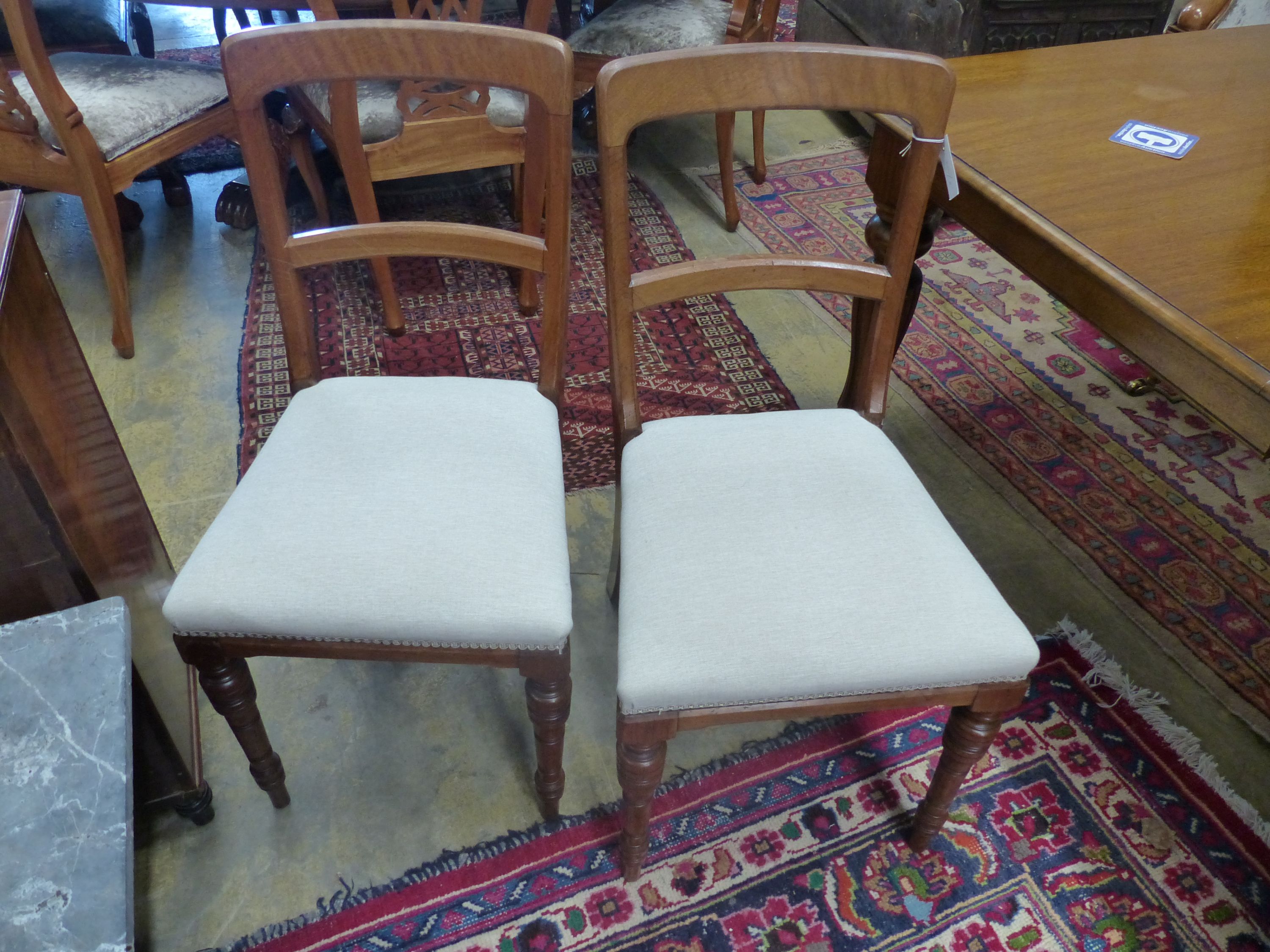 A set of four late Victorian mahogany dining chairs